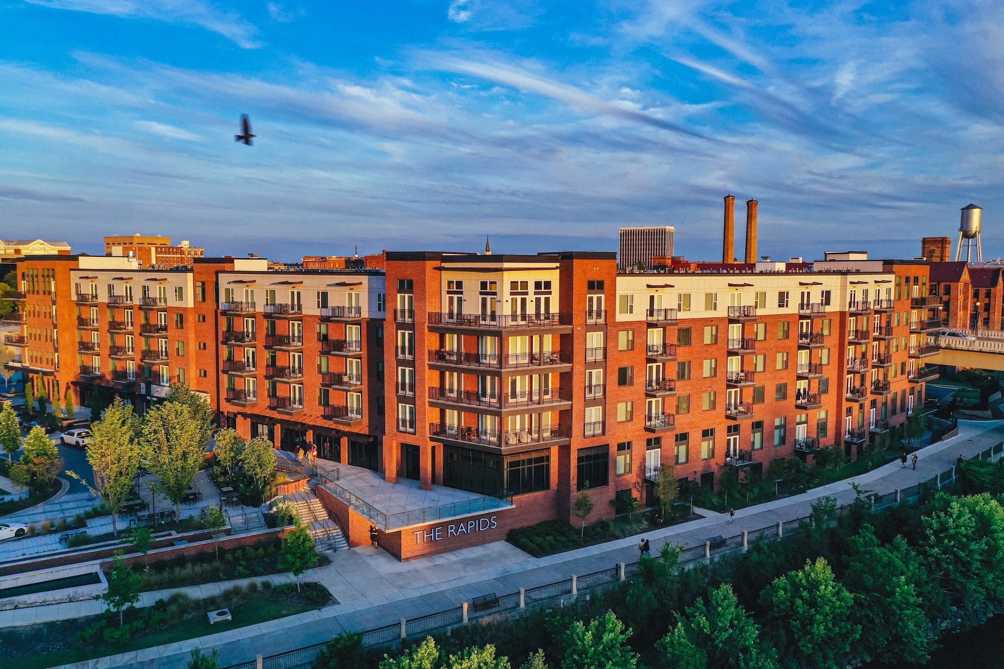 The Rapids Luxury Apartments opened in 2017, completing the first of four phases for the Riverfront Development.